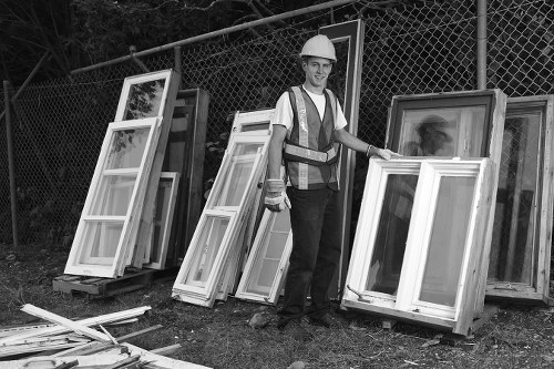Builders removing construction waste in Golders Green