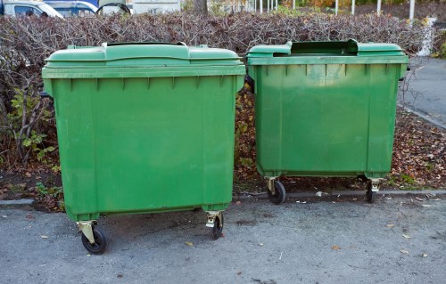 Workers managing builders waste removal efficiently