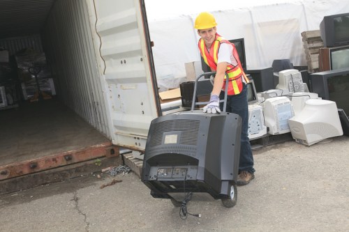 Professional operator using grab hire equipment