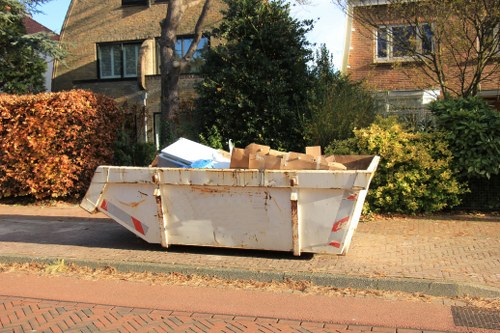 Professional waste clearance team managing construction debris.